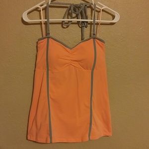Fox coral halter or tube top w/ gray piping.