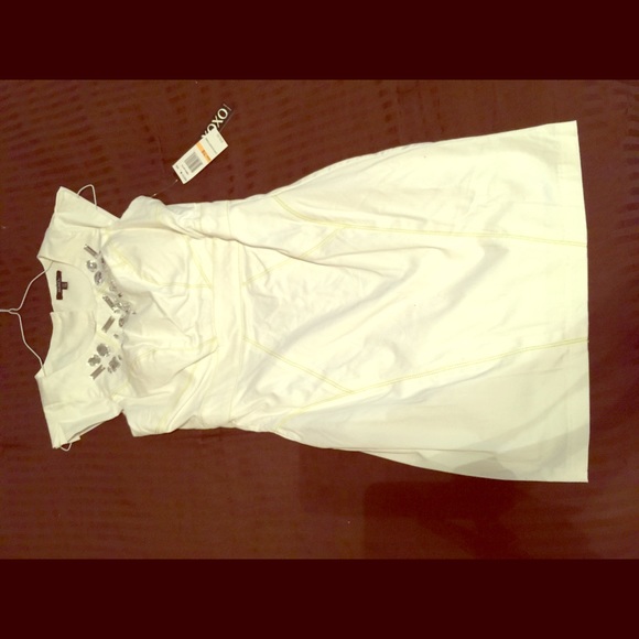 White XOXO mini dress.