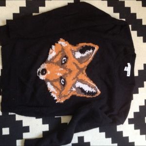 Adorable fox sweater.