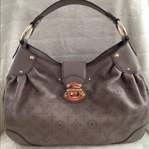 Louis Vuitton Black Monogram Mahina Solar Leather Pony-style calfskin  ref.946477 - Joli Closet