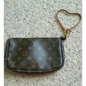 Louis Vuitton pouchette. Made in France.
