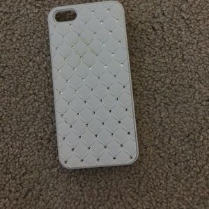 a white with Jelws phone case