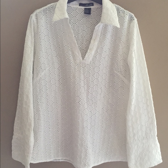 Long sleeved white eyelet top.