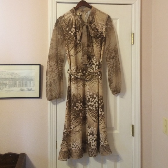 Sheer sleeved dress with belt