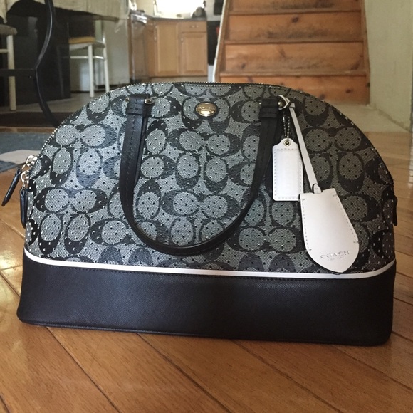 Coach Handbags - Black medium sized Coach Bag