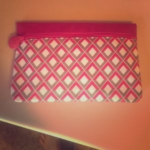 Pink and white ipsy bag