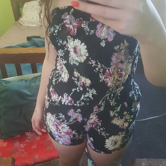 Black romper with purple and white flowers