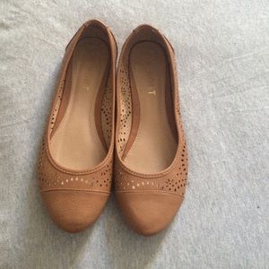 Report tan flats.