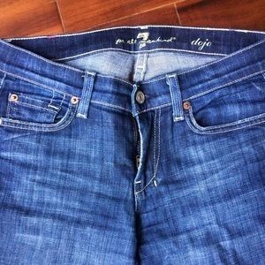 2 pairs of Seven Dojo bootcut blue jeans.