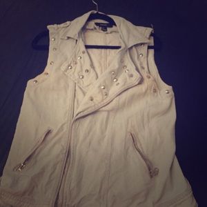 Light denim studded vest