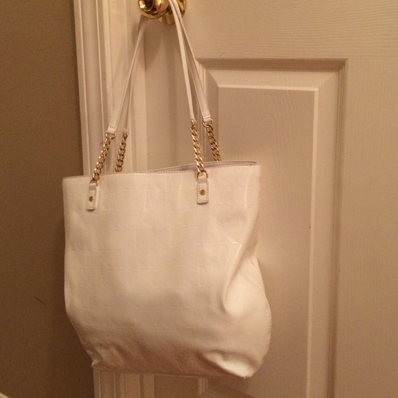 Michael Kors Handbags - White patent leather authentic Michael kors purse