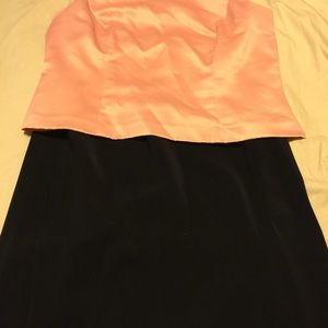 Black skirt and peach colored top
