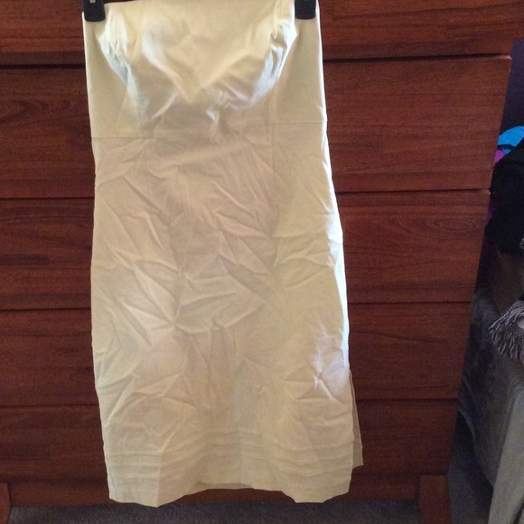Pale lime green strapless form fitting dress