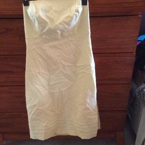 Pale lime green strapless form fitting dress