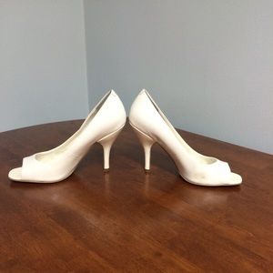 BCBGeneration open toe white pumps