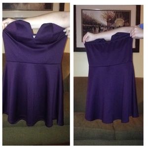 Purple knee length skater dress.