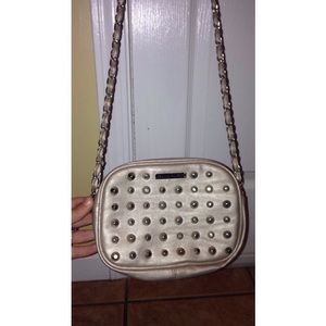 Light gold purse with long strap and studs