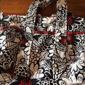 Diaper bag with changing pad and wipe holder