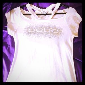 ❌sold❌White BEBE shirt with rhinestones.