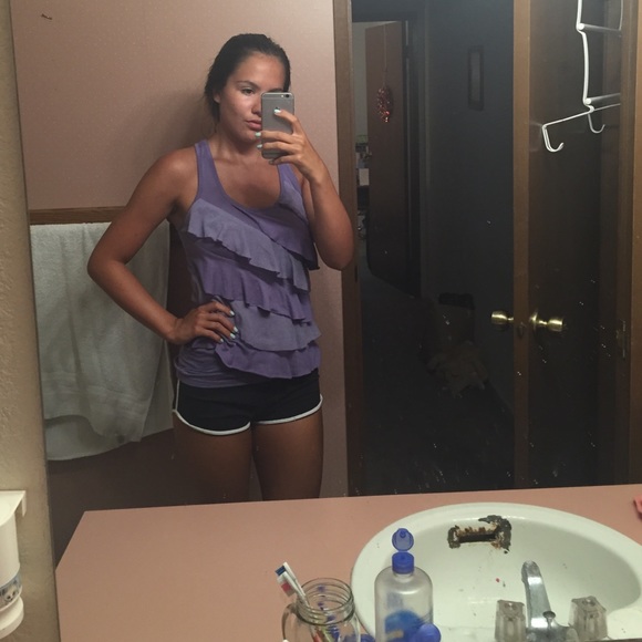 Purple ruffled shirt
