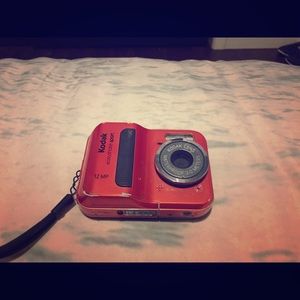 KODAK SPORT SELLING OLD CAMERAS TO BUY NEW ONE