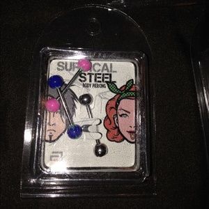 Surgical steel tongue rings.