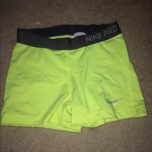 Neon Yellow Nike sliders