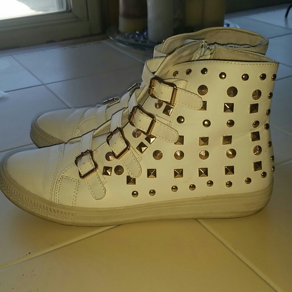 White and gold studded sneakers