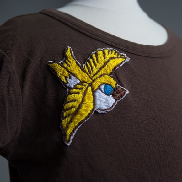 Blue eyed yellow bird t-shirt