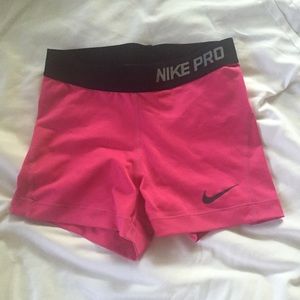 Nike Pro spandex in pink-magenta and black