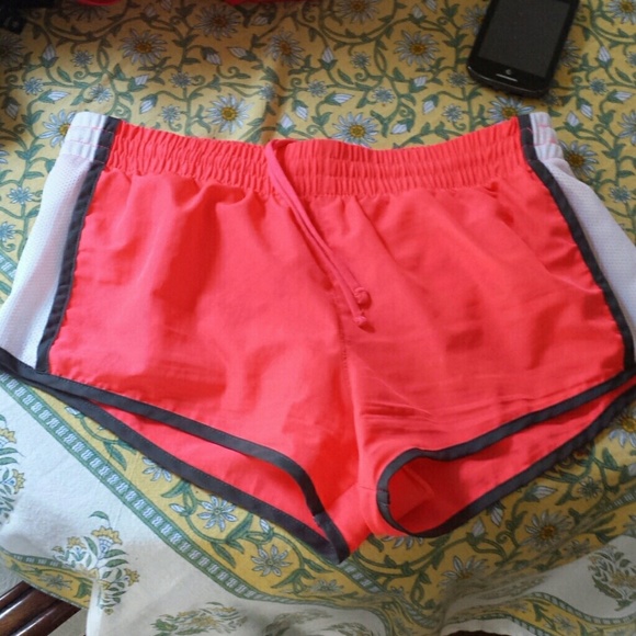 Pink shorts with white sides. Strechy waist