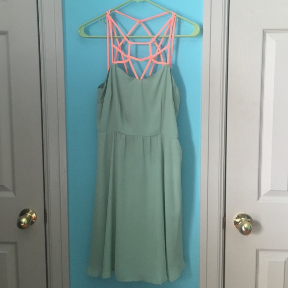 mint green dress with delicate neon orange straps✨