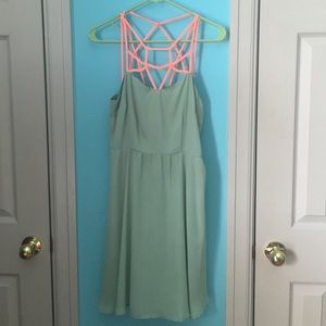 mint green dress with delicate neon orange straps✨
