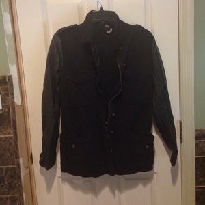 Black polyester jacket with leather sleeves