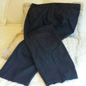 Dark denim trouser pants with back slit buttoned p