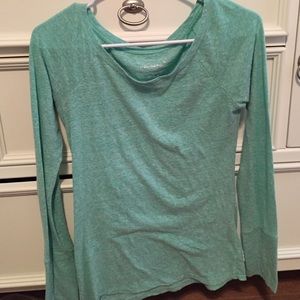 Aqua/teal long sleeve with a pattern