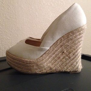 Cream/Ivory Wedge Peep Toe Pumps.