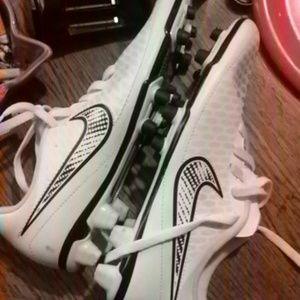 Lime green and dark green soccer cleats for women