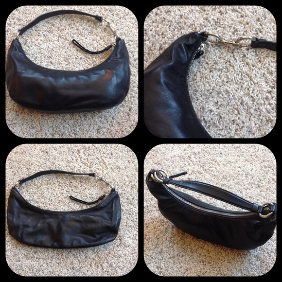 Small black leather baguette purse.