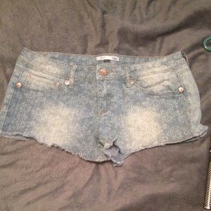 Lace design light colored Jean shorts