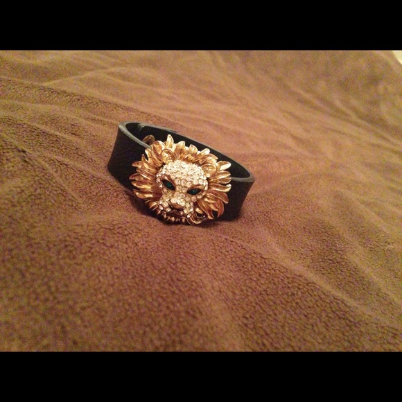 Blinged out lion on faux leather bracket strap