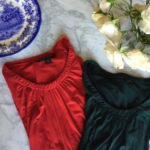 Red and hunter green long sleeve tees