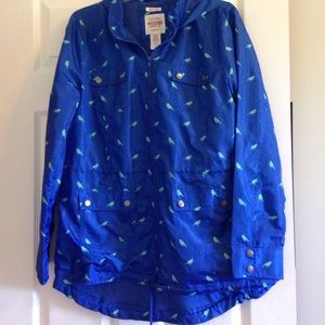 Blue rain jacket with teal birds
