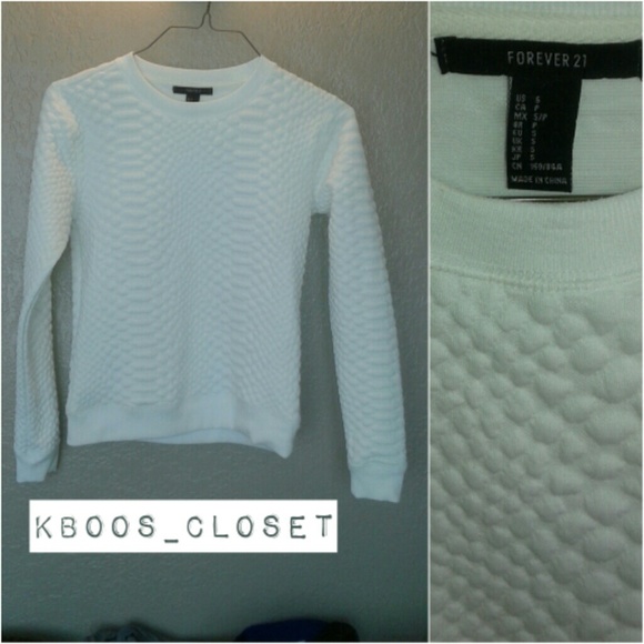 Super stylish, reptile detail sweater!