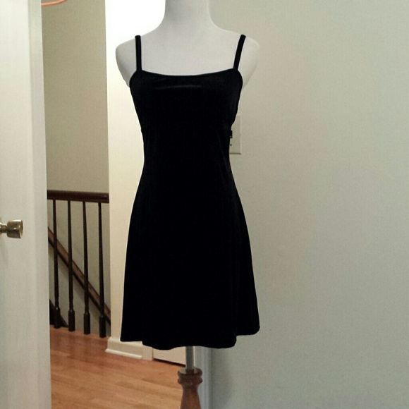 Little black dress with open cutout back.