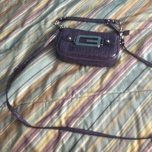 Over the shoulder purse that can be a hand bag
