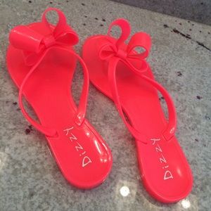 Neon Pink flip flops with bow