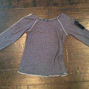 Long sleeved stone gray tee.