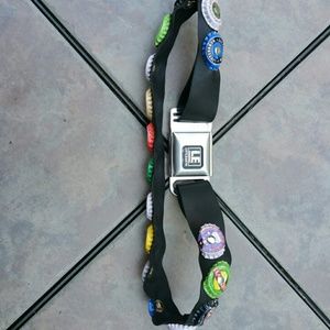Bottle cap belt with seat belt closure