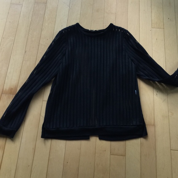 Black netted long sleeve, split back